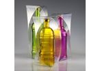 Innovative transparent packaging for bottles and flacons provides a new alternative for showcasing brands 