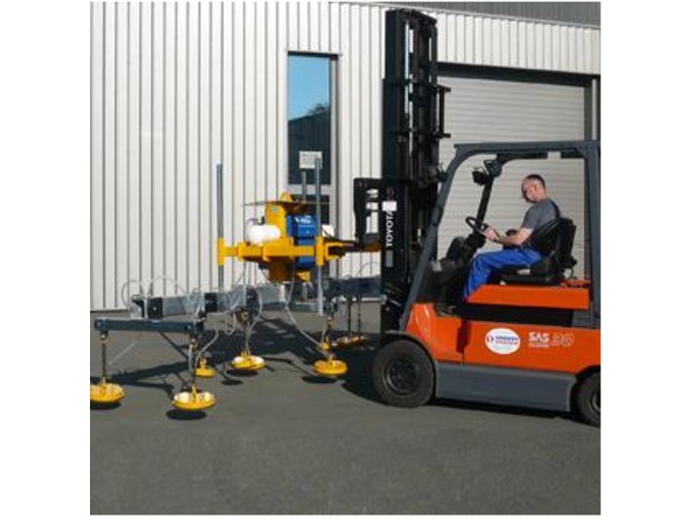 Lifting Beams In Custom Made Suction Cups On Forklift Truck