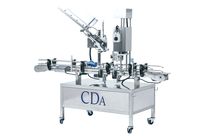 Integral capsule or foil dispensing &amp;amp; crimping system - Cap System Model