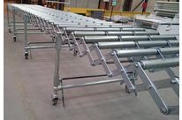 Free roller or wheel extendable conveyor