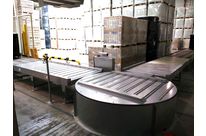 Driven turntable conveyor