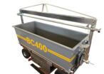 Container tipper or tipping bucket