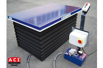 Super-flat rising worktables