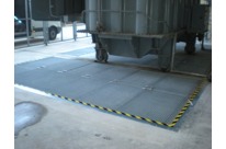 Fire extinguishing system for concrete pits under electrical transformers