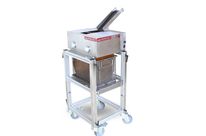 Shock absorption system for work pieces evacuated in bulk Tong&#039;HUMARD®